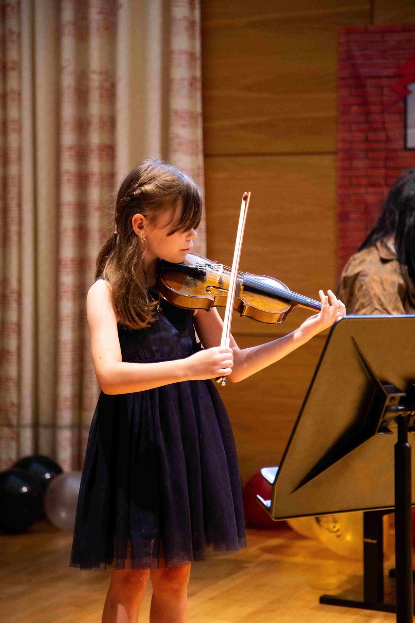 Young student playing violin